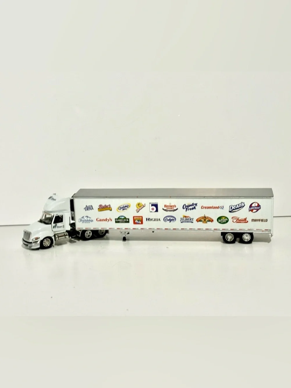 DEAN FOODS 1:64 SCALE INTERNATIONAL PROSTAR TRACTOR-TRAILER WITH THERMO KING